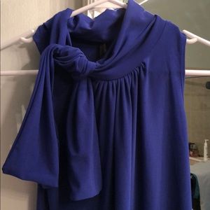 Bundle of 2 sleeveless tie neck shirts